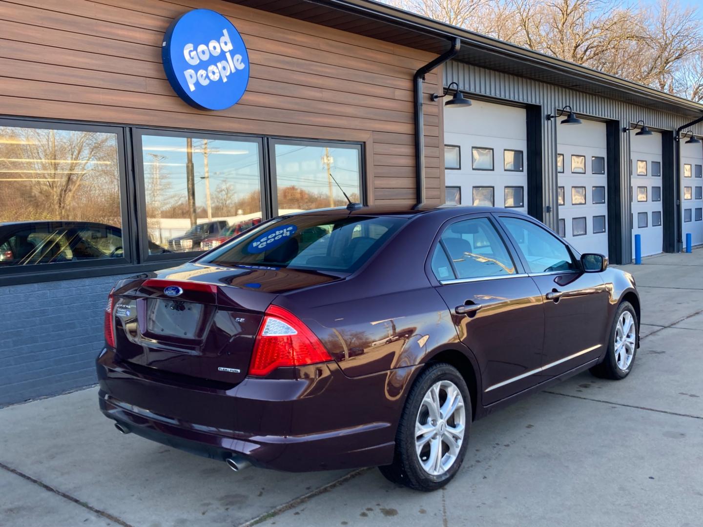 2012 Bordeaux Reserve Met Ford Fusion SE (3FAHP0HG1CR) with an 3.0L V6 DOHC 24V engine, located at 1800 South Ihm Blvd, Freeport, IL, 61032, (815) 232-5543, 42.278645, -89.607994 - Photo#1